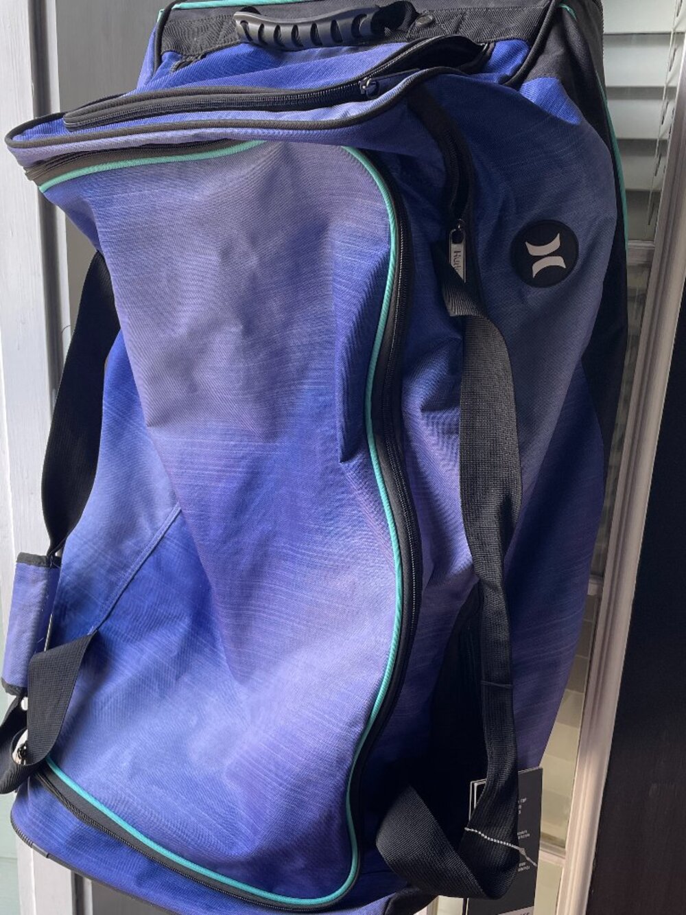 Hurley rolling duffel bag-gradient blue and black NWT